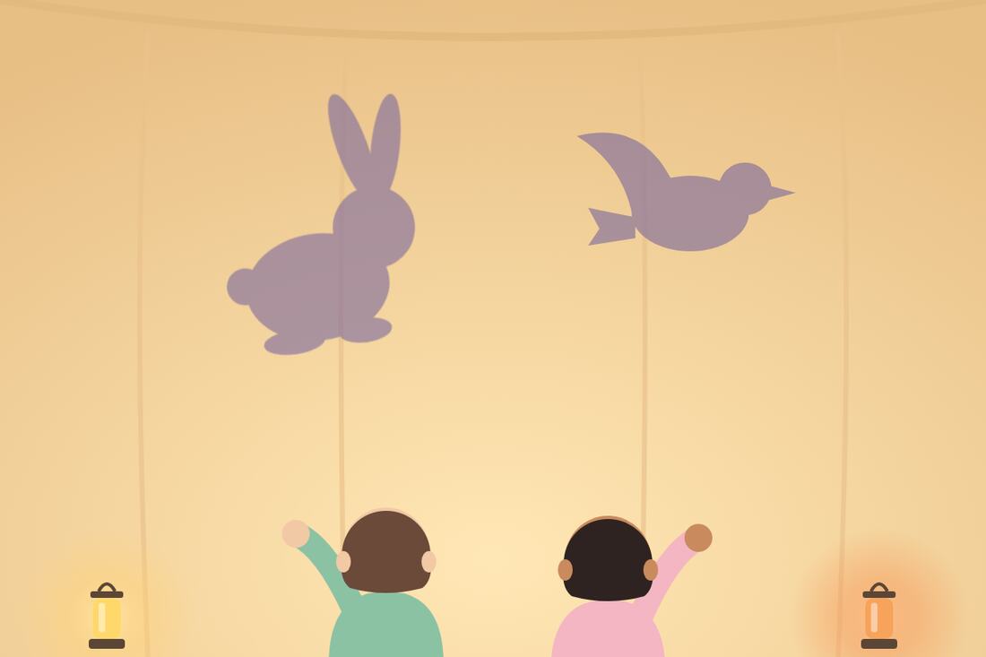 Un lapin et un oiseau en ombres chinoises sur le drap